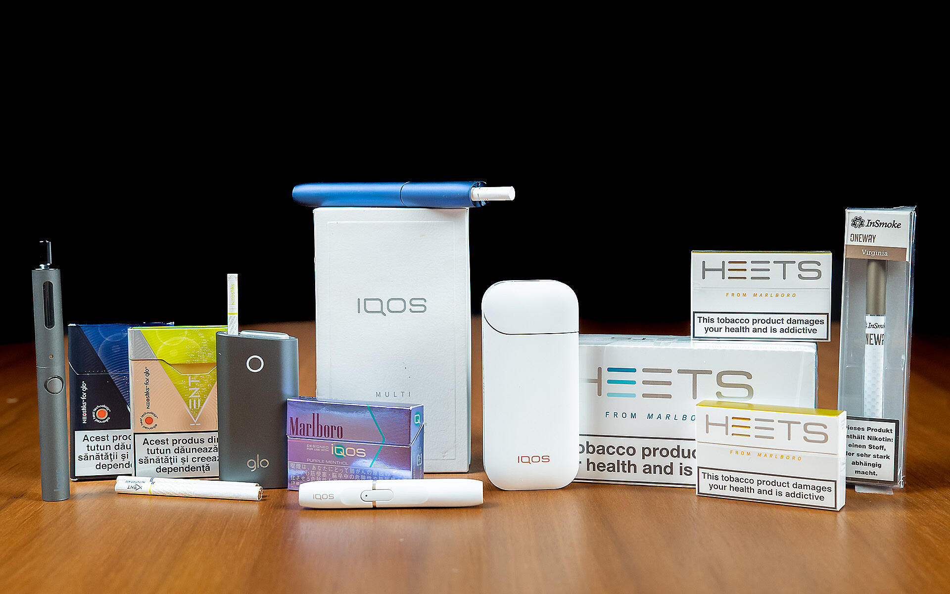 Array of heated tobacco products on a table.